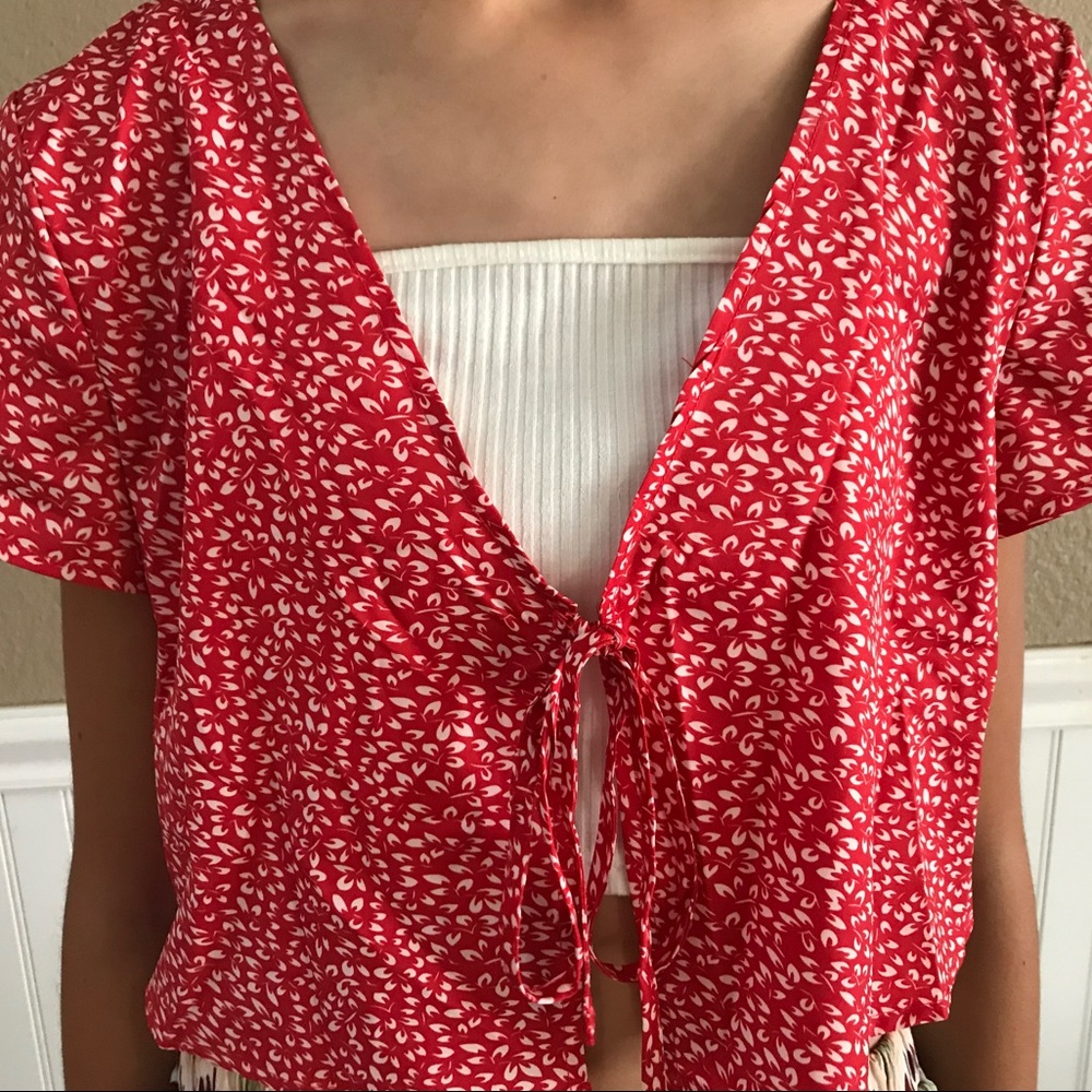 red flowery blouse